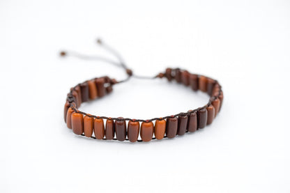 Handcrafted Kuka Wood Bead Bracelet: Rustic Cylinder Wristband